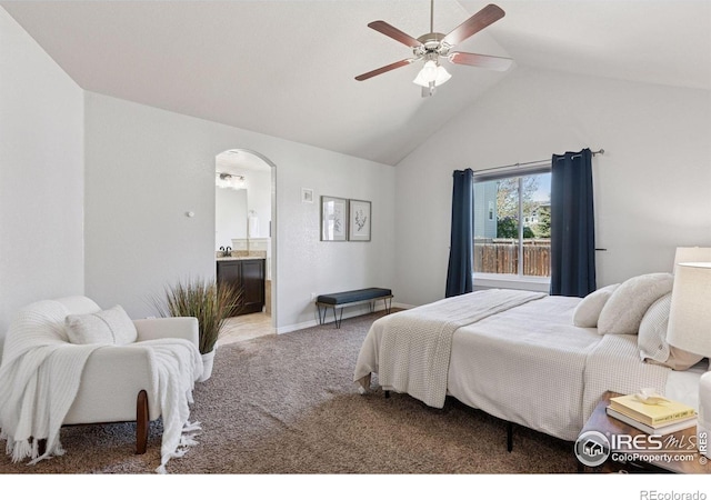 9137 Harlequin Cir, Frederick, CO 80504 - bedroom featuring light colored carpet, arched walkways, ensuite bath, a ceiling fan, and high vaulted ceiling