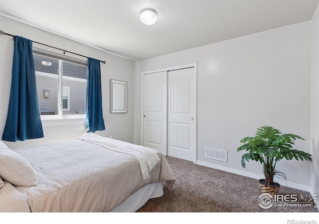 9137 Harlequin Cir, Frederick, CO 80504 - bedroom featuring carpet, a closet, and baseboards