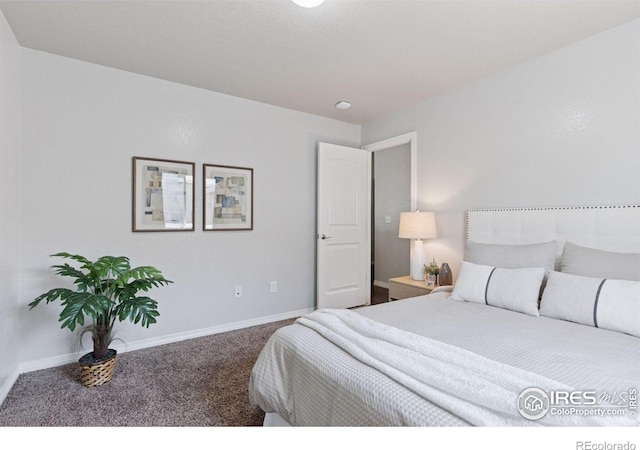 9137 Harlequin Cir, Frederick, CO 80504 - carpeted bedroom featuring baseboards