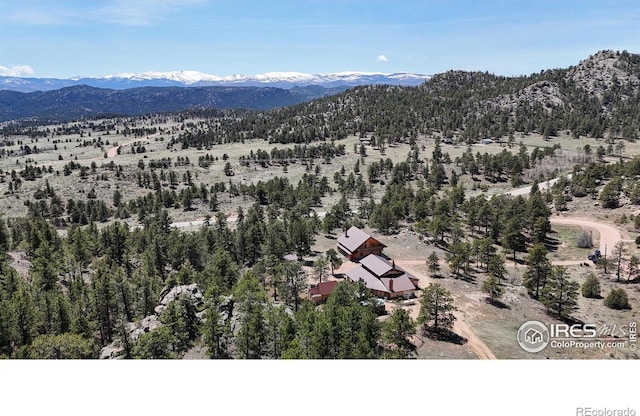 view from above of property featuring a mountain backdrop