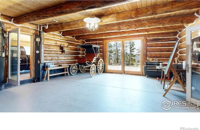 garage with wood ceiling and french doors
