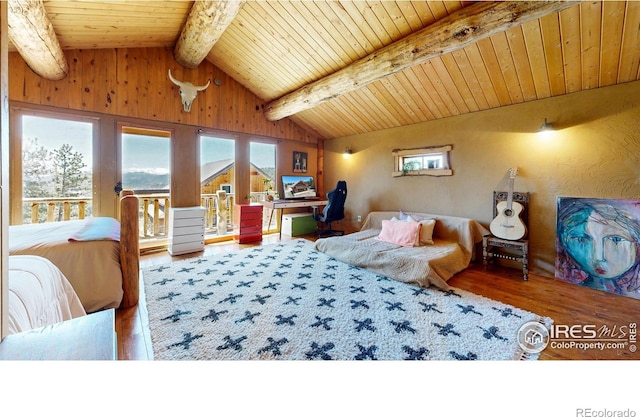 bedroom featuring wood finished floors, an office area, wooden ceiling, and access to outside