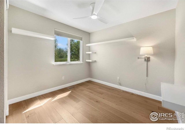 536 W Sycamore Cir, Louisville, CO 80027 - unfurnished room with a ceiling fan, wood finished floors, and baseboards