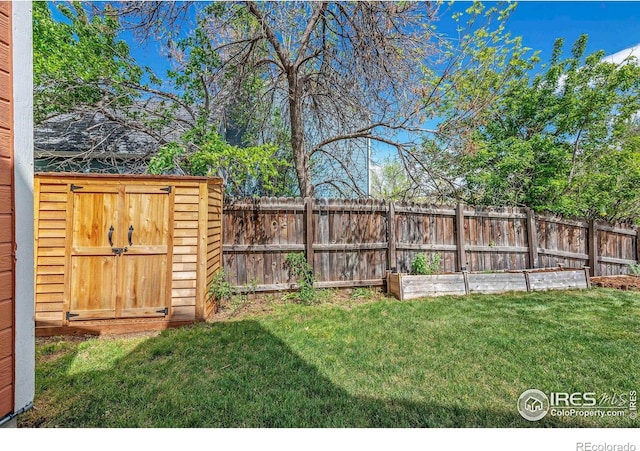536 W Sycamore Cir, Louisville, CO 80027 - view of yard featuring a shed and an outbuilding