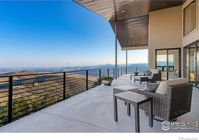 9360 Gold Mine Rd, Loveland, CO 80538 - view of patio featuring a balcony