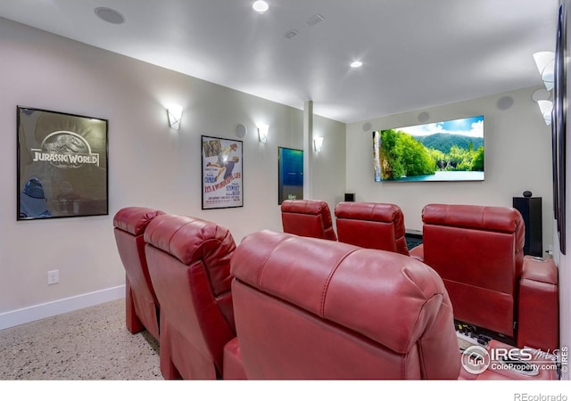9360 Gold Mine Rd, Loveland, CO 80538 - home theater room with baseboards, speckled floor, and recessed lighting