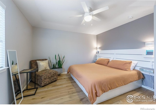 1675 Saratoga Dr, Lafayette, CO 80026 - bedroom featuring wood finished floors and ceiling fan