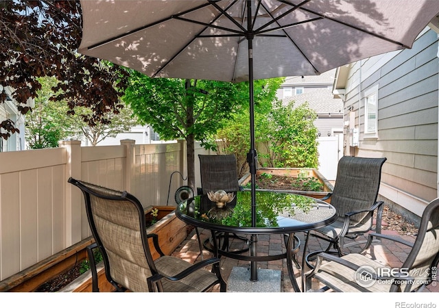 1675 Saratoga Dr, Lafayette, CO 80026 - view of patio with outdoor dining area