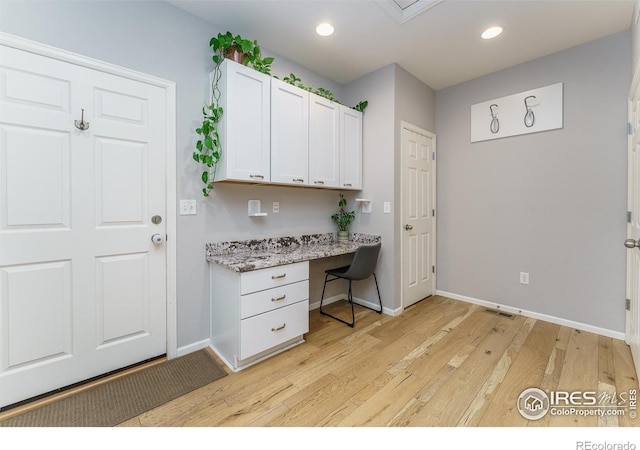 1675 Saratoga Dr, Lafayette, CO 80026 - office area with built in desk, light wood-style floors, and recessed lighting
