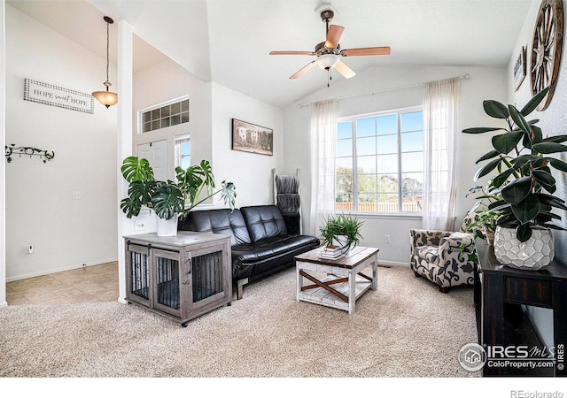7235 Andover St, Wellington, CO 80549 - carpeted living room with vaulted ceiling, ceiling fan, and baseboards