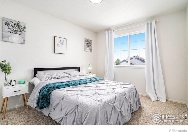 7235 Andover St, Wellington, CO 80549 - bedroom with carpet floors and baseboards