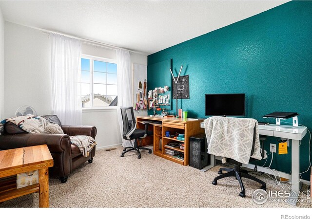 7235 Andover St, Wellington, CO 80549 - carpeted home office with baseboards