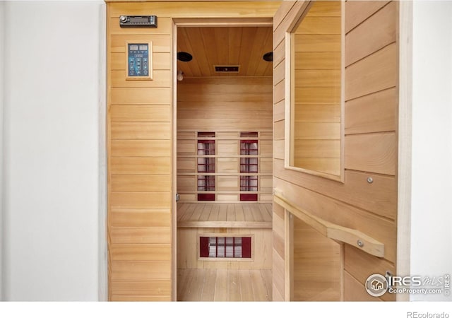 sauna featuring wood ceiling