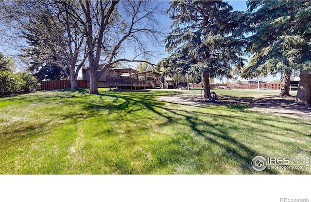 view of yard featuring a deck