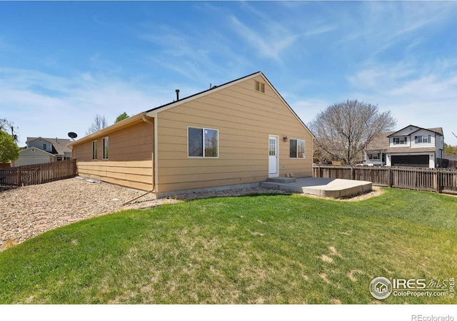 rear view of house featuring a patio