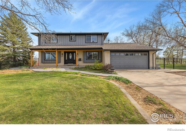 traditional-style home featuring driveway, a garage, brick siding, and a porch