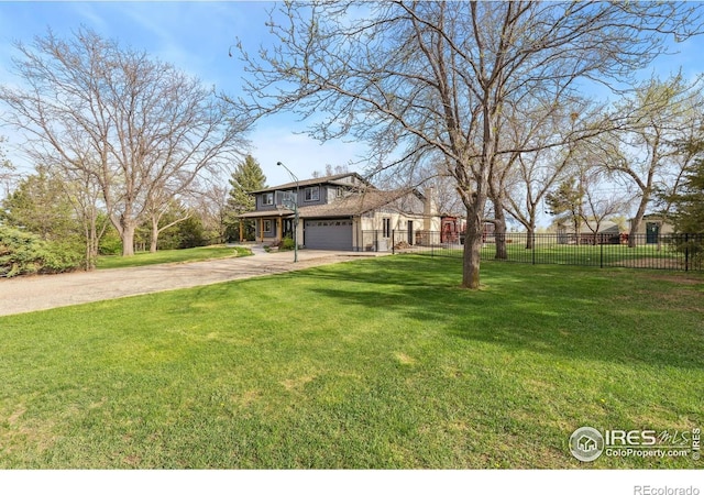 view of front of house with concrete driveway and an attached garage