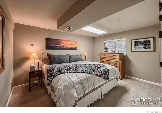 1561 Belmont Dr, Longmont, CO 80503 - bedroom featuring baseboards and light carpet