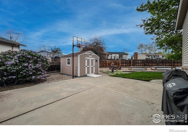 1561 Belmont Dr, Longmont, CO 80503 - fenced backyard with a patio and a residential view