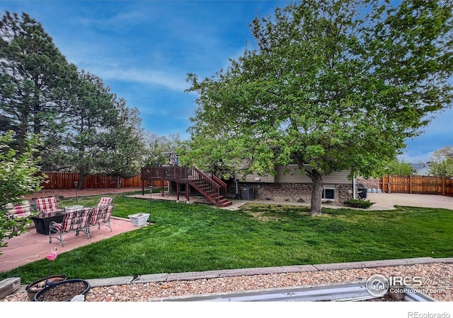 1561 Belmont Dr, Longmont, CO 80503 - view of yard featuring a patio area and stairs