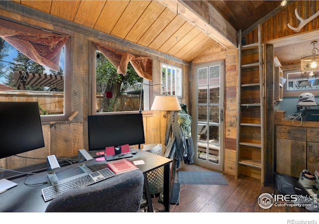 office space featuring wood ceiling, hardwood / wood-style floors, and wooden walls