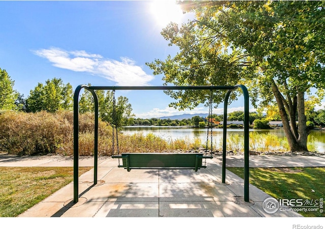 view of patio / terrace featuring a water view