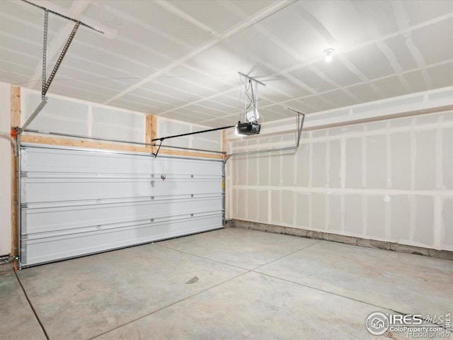 garage featuring a garage door opener