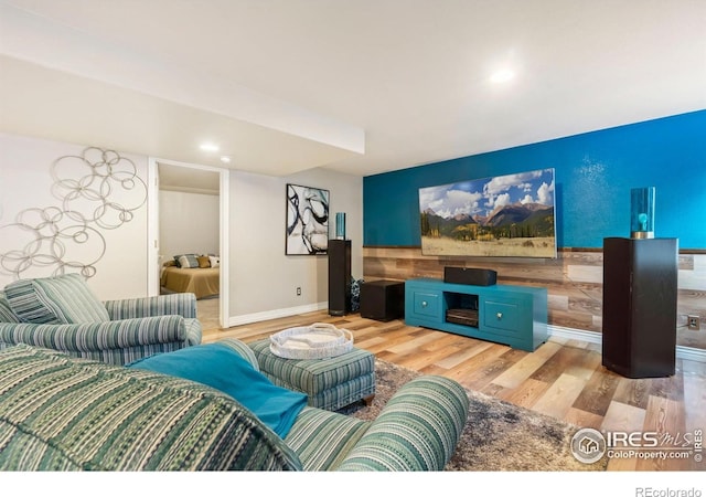 living room featuring light wood-style floors and recessed lighting