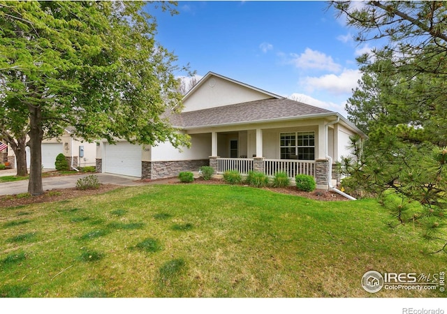1380 Swainson Rd, Eaton, CO 80615 - craftsman inspired home featuring a porch, stucco siding, driveway, stone siding, and a front lawn