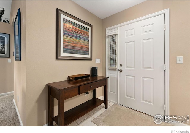 1380 Swainson Rd, Eaton, CO 80615 - entrance foyer featuring baseboards and light tile patterned floors