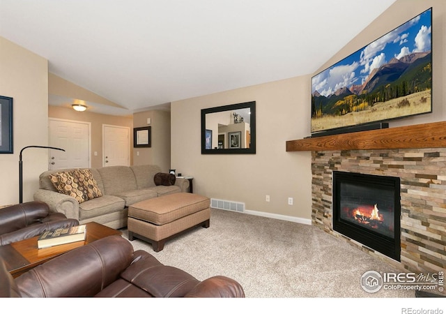 1380 Swainson Rd, Eaton, CO 80615 - living area with lofted ceiling, carpet floors, a glass covered fireplace, and baseboards