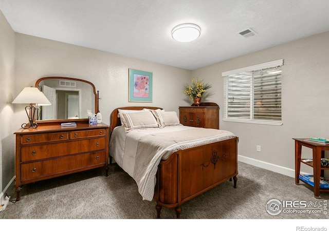 1380 Swainson Rd, Eaton, CO 80615 - bedroom with dark colored carpet and baseboards
