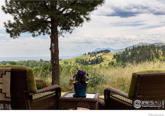 view of patio / terrace with a mountain view