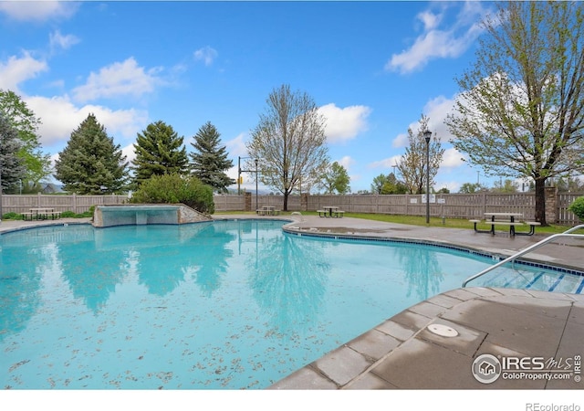 2502 Owens Ave Unit 201, Fort Collins, CO 80528 - community pool featuring a fenced backyard and a patio area