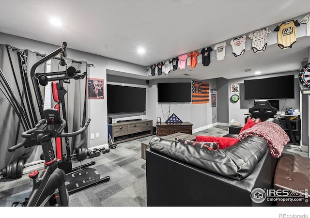 living area featuring baseboards and recessed lighting