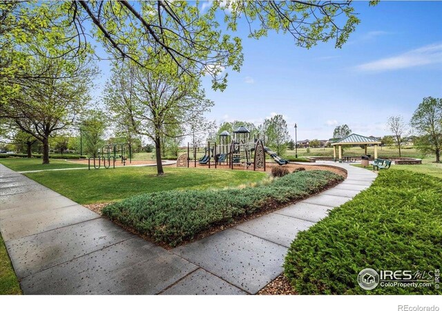 community playground with a lawn and a gazebo