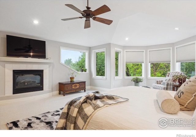 4059 Nevis St, Boulder, CO 80301 - bedroom with multiple windows, recessed lighting, a fireplace, ceiling fan, and carpet flooring
