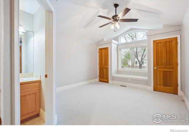 4059 Nevis St, Boulder, CO 80301 - unfurnished bedroom with lofted ceiling and light carpet