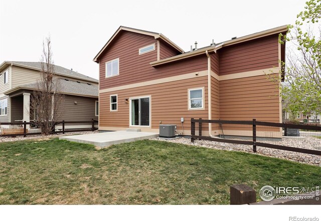 back of house with a patio and cooling unit