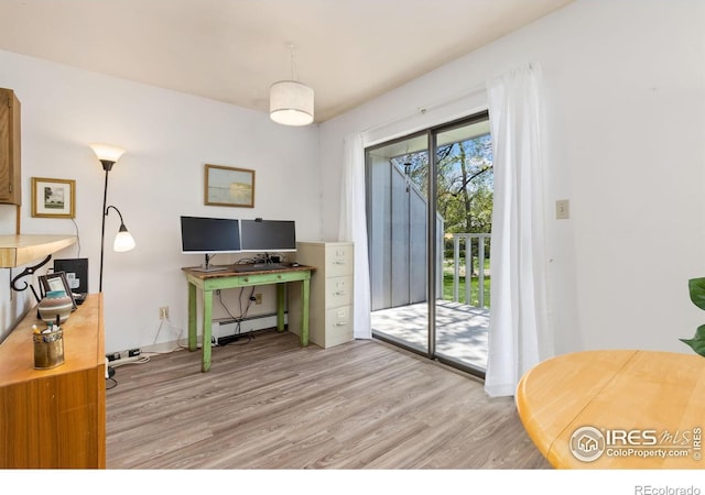 705 E Drake Rd Unit 22, Fort Collins, CO 80525 - office space featuring light wood finished floors and a baseboard heating unit