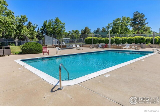 705 E Drake Rd Unit 22, Fort Collins, CO 80525 - community pool with a patio and fence