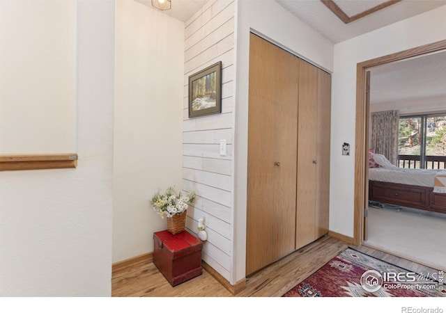620 Macgregor Ave Unit 2, Estes Park, CO 80517 - corridor featuring light wood-style flooring and baseboards