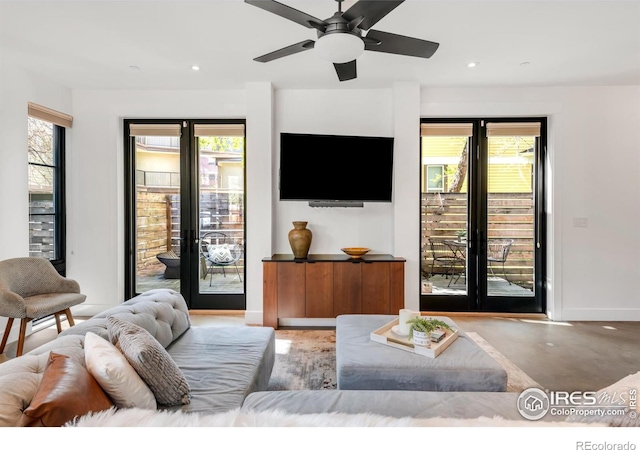 1838 22nd St, Boulder, CO 80302 - living room featuring healthy amount of natural light, recessed lighting, baseboards, and a ceiling fan