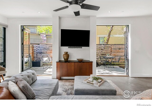 1838 22nd St, Boulder, CO 80302 - living room with healthy amount of natural light, a ceiling fan, and recessed lighting
