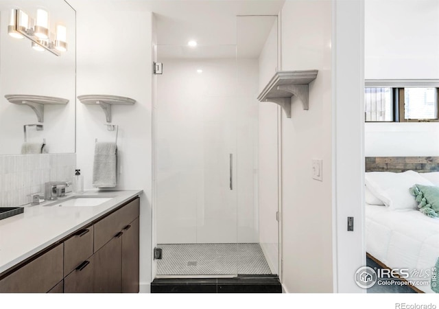 1838 22nd St, Boulder, CO 80302 - full bath featuring a stall shower, tasteful backsplash, recessed lighting, and vanity