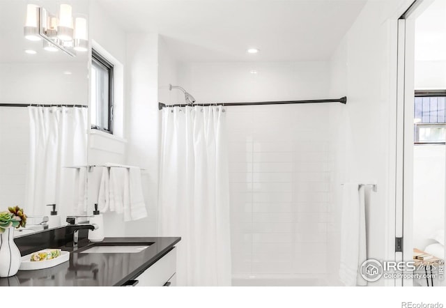 1838 22nd St, Boulder, CO 80302 - full bathroom featuring plenty of natural light, vanity, and recessed lighting