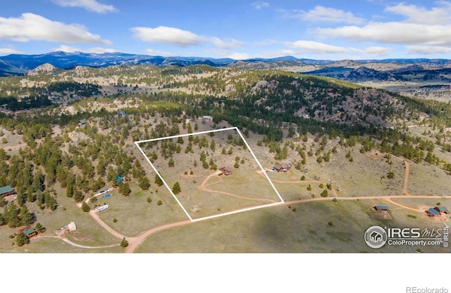 331 Laplata Dr, Livermore, CO 80536 - aerial view of property's location featuring a mountain backdrop and property boundaries highlighted