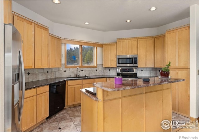331 Laplata Dr, Livermore, CO 80536 - kitchen with appliances with stainless steel finishes, a sink, backsplash, light tile patterned flooring, and recessed lighting