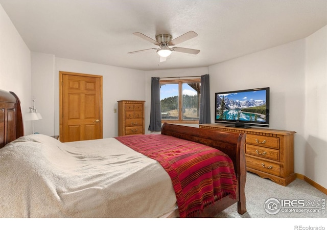331 Laplata Dr, Livermore, CO 80536 - bedroom with carpet, a ceiling fan, and baseboards