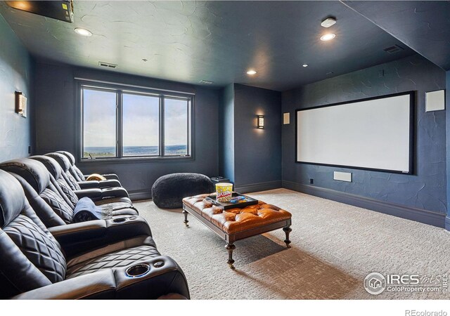cinema room with carpet flooring, recessed lighting, and baseboards